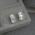 Silver Tone Triple White Cat Eye Oval Ornate Frame Stud Earrings view 2
