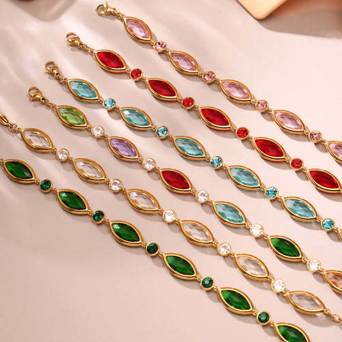 Flat layout of multicolor marquise glass station bracelets