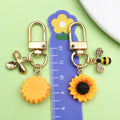Bee and Honeycomb Charm Keychains Featuring Flower Across 25 Pictured Variations view 2