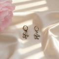 Silver Daisy Flower Huggie Hoop Earrings Gold Center view 1