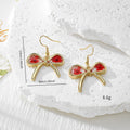 Gold Bow Dried Flower Resin Earrings Ten Color Styles view 4