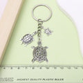 Starfish, Shell and Mermaid Charm Keychains Featuring Silver Turtle Across 16 Variations view 4