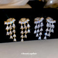 Crystal Fan Tassel Clip-On Earrings in Silver and Gold view 1