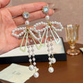 Oversized Pearl Look Bow Long Chain Tassel Earrings view 2