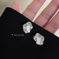 Silver Tone Molten Texture Irregular Open Sculpted Stud Earrings view 1