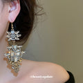 Ornate Architectural Chandelier Hook Earrings With Polished Metal Details view 3