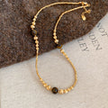 Gold Tone Beaded Necklace With Brown Round Accents view 6