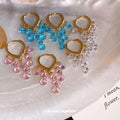 Crystal Bead Cascade Huggie Earrings with Polished Metal Tone Details view 1