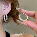 Rounded Sculpted Hoop Earrings In Gold And Silver Tones view 3