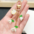 White Bell Flower Shell and Leaf Clasp Keychains with Metal Hardware view 3