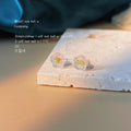 Iridescent Clear Mini Flower Stud Earrings Gold Center Pair view 4