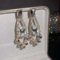 Clear Crystal Chandelier Earrings in Gold and Silver Tone view 6