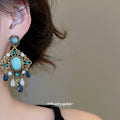 Gold Tone Blue Cabochon And Teardrop Chandelier Earrings view 3