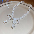White Faux Pearl Beaded Bow Choker Necklace and Bracelet view 7