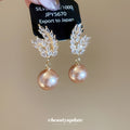 Gold Tone Wheat Leaf Earrings With Champagne Pearl Drops view 2