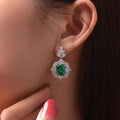 Green Oval Floral Halo Long Drop Earrings In Silver Tone view 2