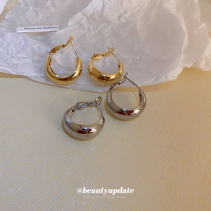 Rounded Hoop And Chain Tassel Earrings In Three Finishes