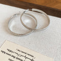 Slim Metal Hoop Earrings in Gold and Silver Tone Size Options view 7