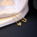 Gold Tone Heart Safety Pin Asymmetrical Stud Earrings view 2
