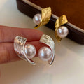 Textured Metal and Pearl Stud Earrings in Gold and Silver Tone view 1