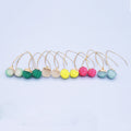 Gold Tone Long Wire Textured Resin Ball Drop Earrings view 5