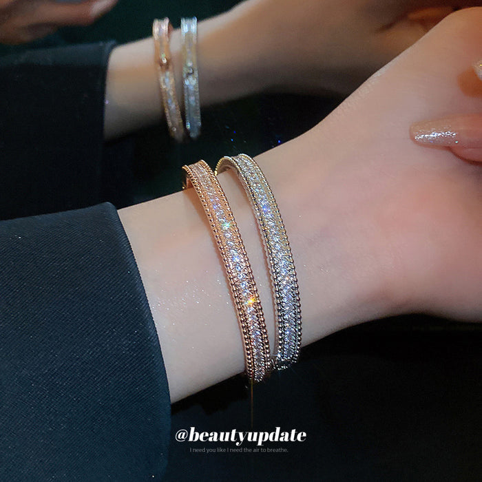Silver Tone Double Row Crystal Hinged Bangle With Beaded Edges
