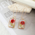 Gold Tone Rectangular Clear Resin Pressed Flower Long Wire Earrings view 7