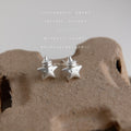 Silver Tone Matte Sculpted Star And Clear Stone Stud Earrings view 3