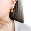 Twisted Link Ribbed Hoop Earrings Gold and Steel Tones view 1