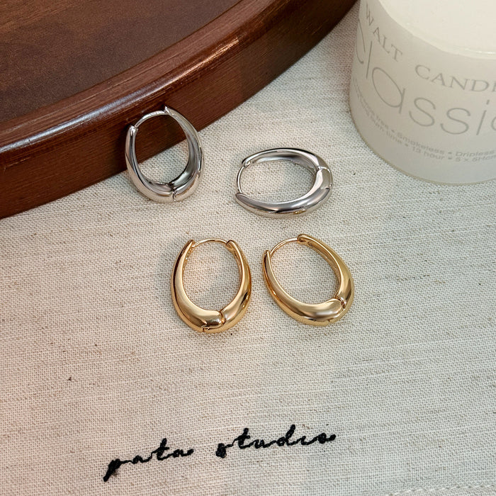 Gold and Silver Irregular Oval Medium Huggie Hoop Earrings