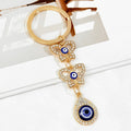 Gold Rhinestone Evil Eye Keychain With Butterfly And Hamsa Charm view 3