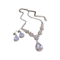 Silver Tone Round Crystal Cluster Necklace And Iridescent Teardrop Earrings view 5