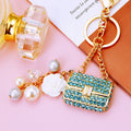 Crystal Mini Handbag Keychains with Pearl and Flower Dangles in Eight Options view 1