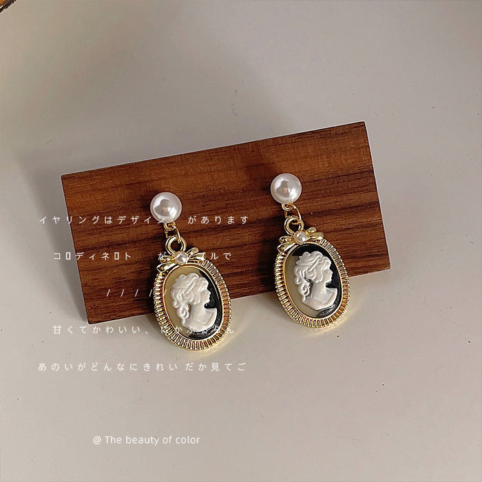 Gold Tone Pearl Top Black White Cameo Profile Medallion Drop Earrings