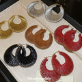 Woven Open Circle Huggie Earrings In Eight Designs view 1