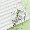 Western Cowboy Charm Keychains Featuring Silver Boot Across 30 Pictured Variations view 4