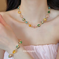 Gold Oval Multicolor Resin Cabochon Bracelet and Necklace view 3