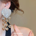 Crystal Heart Tassel Earrings in Polished Statement Design view 3