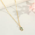 Gold Tone Crystal Hamsa Hand Pendant Necklace with Fine Chain view 2