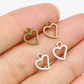 Small Open Heart Charms in Two Antique Metal Finishes view 1