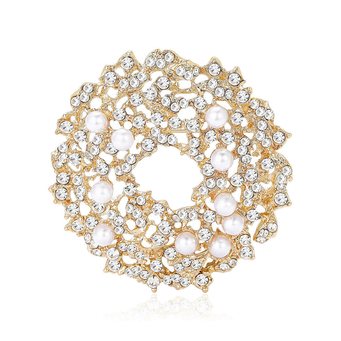 Crystal Floral Wreath Brooch With Polished Metal And Sculpted Decorative Details