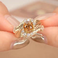 Gold Tone Feather Embossed Ring Yellow Oval Center Clear Stones view 2