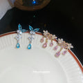 Pink Crystal Butterfly Drop Earrings with Reflective Details view 2