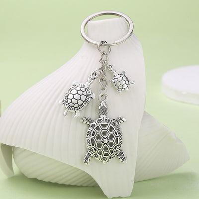 Image 1 showing a turtle keychain.