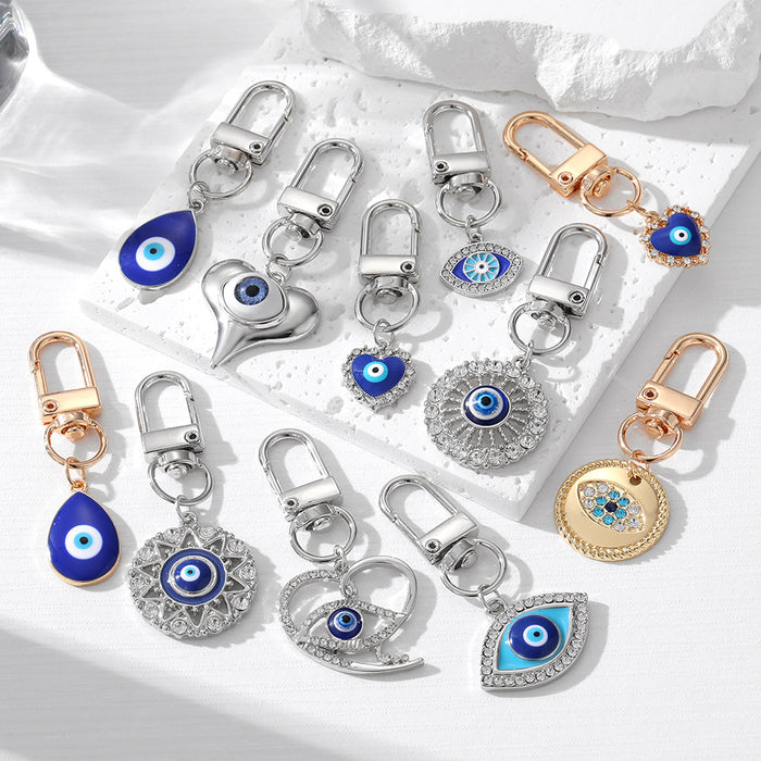 Gold and Silver Tone Blue Evil Eye Clip Keychains in Eleven Styles