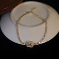 Gold Tone Tennis Bracelet With Square Clear Crystal Halo Center view 4
