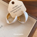 Cream Enamel Twisted Hoop Earrings with Gold Tone Edges view 3