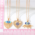 Gold and Silver Tone Fan Heart and Burst Evil Eye Necklaces view 5