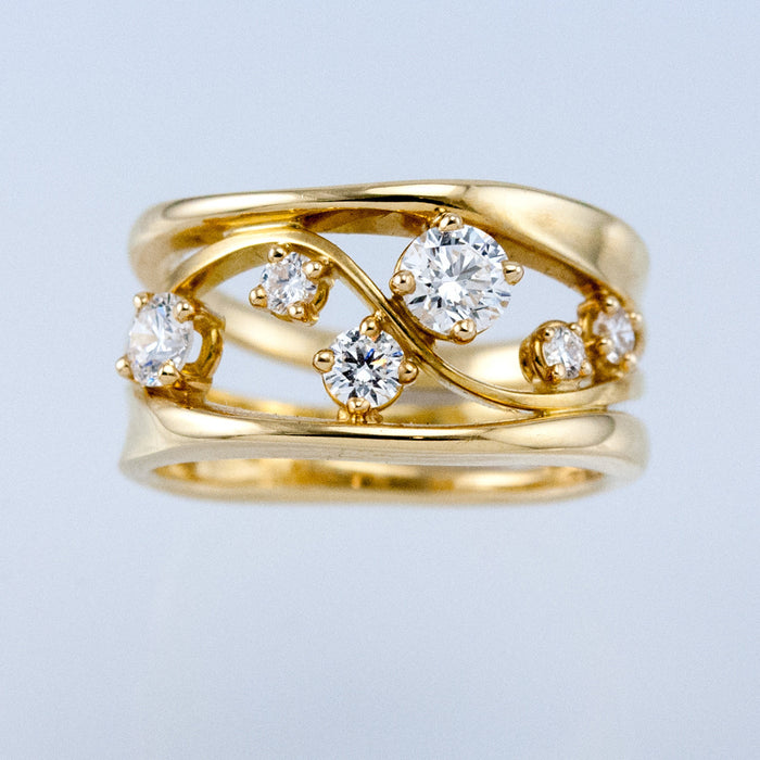 Gold Tone Layered Wave Ring with Scattered Clear Crystals