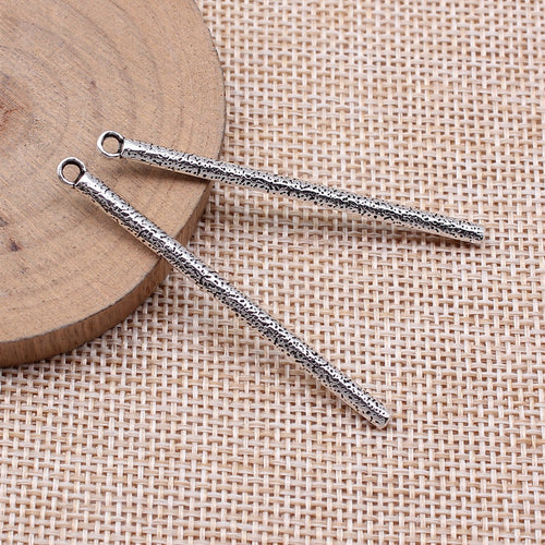 Hammered Slim Bar Metal Pendants wood display of first finish